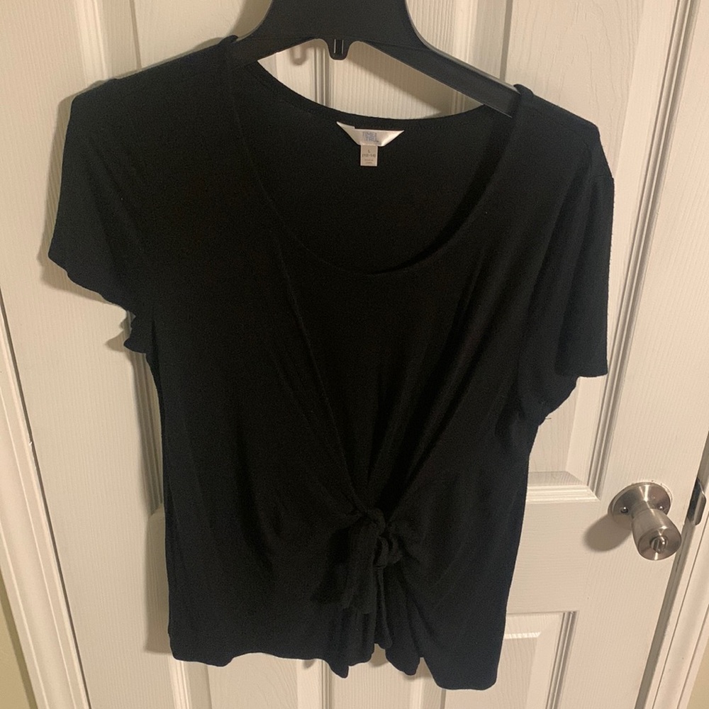 Black dressy top that has a bow in the front